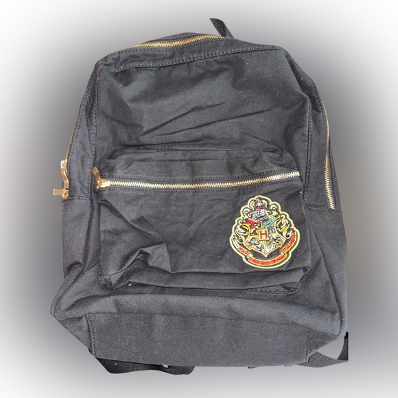 Universal Black Backpack with Gold Accents - Picture 1 of 3